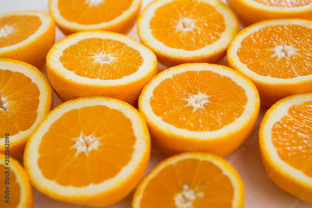Halved oranges on white background Halved oranges on white background