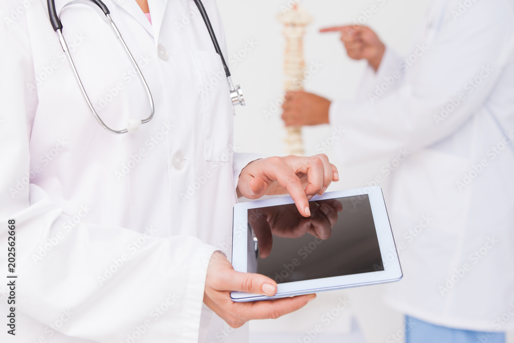 Doctor using tablet pc Doctor using tablet pc