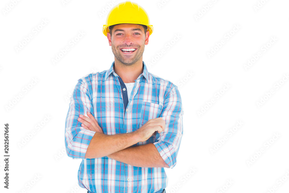 Smiling handyman standing arms crossed Smiling handyman standing arms crossed
