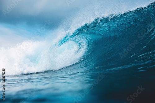 Fotografie, Obraz Ocean blue wave in ocean. Breaking wave for surfing in Bali