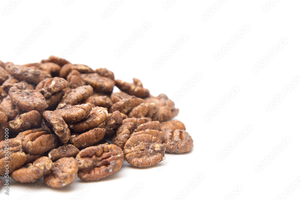 Candied Pecans on a White Background Candied Pecans on a White Background