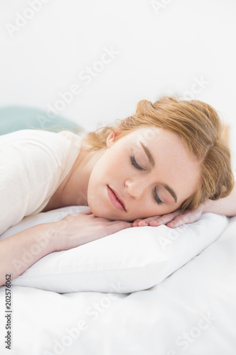 Close up of pretty woman sleeping in bed