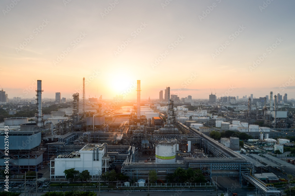 Aerial view of twilight of oil refinery ,Shot from drone of Oil refinery and Petrochemical plant at dusk , Bangkok, Thailand