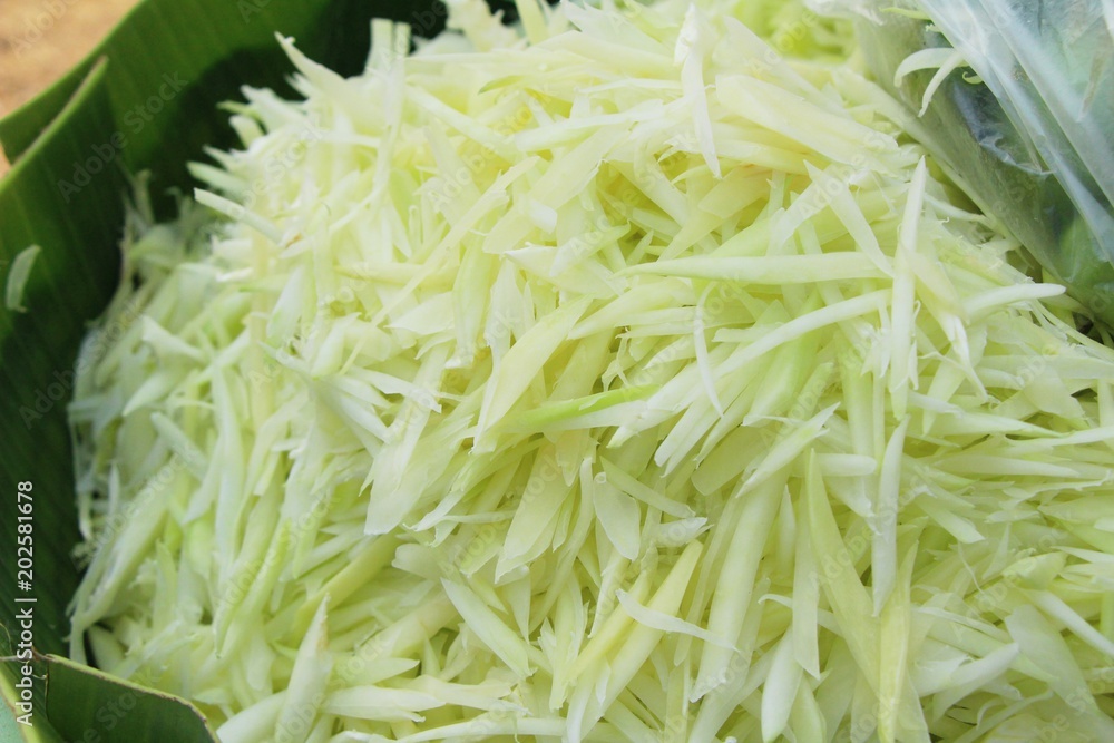 Papaya is chopped for cooking in basket Papaya is chopped for cooking in basket