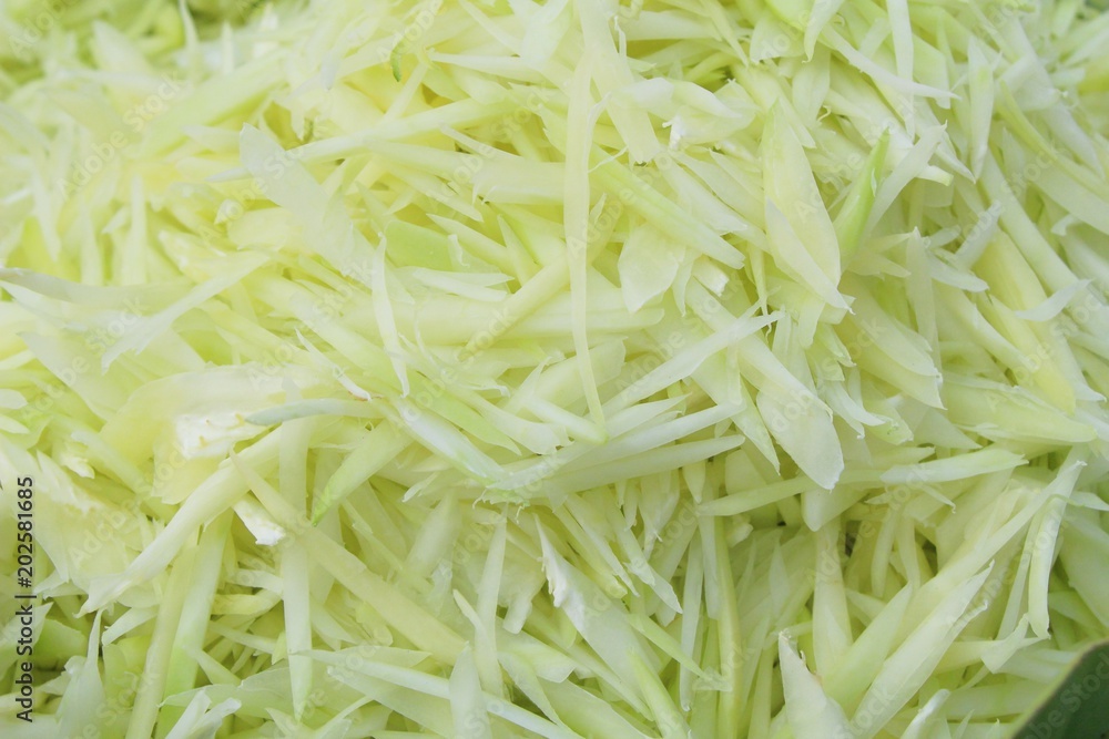 Papaya is chopped for cooking in basket Papaya is chopped for cooking in basket