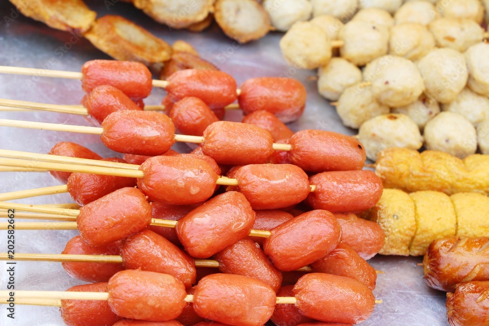 Fried meatballs and sausage at street food