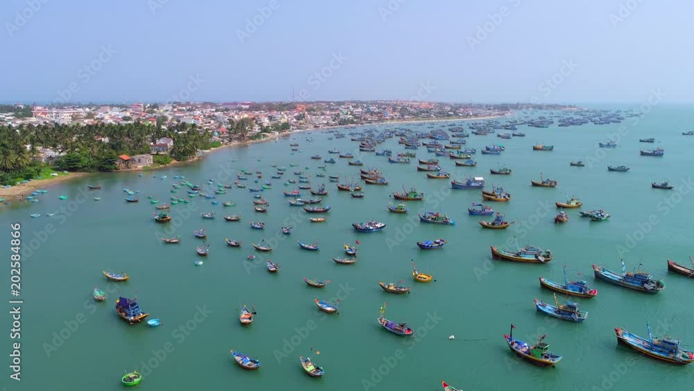 4k Aerial Movie of Vietnamese Small fishing boats and fishing ships in harbour, MuiNe, Vietnam 4k Aerial Movie of Vietnamese Small fishing boats and fishing ships in harbour, MuiNe, Vietnam