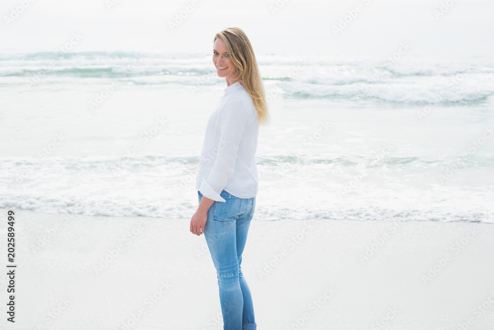 Portrait of a smiling casual woman at beach Portrait of a smiling casual woman at beach