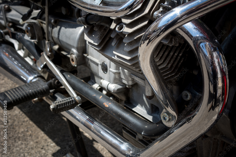 Close Up of the Chrome Parts of an Engine of a Custom Motorbike Close Up of the Chrome Parts of an Engine of a Custom Motorbike