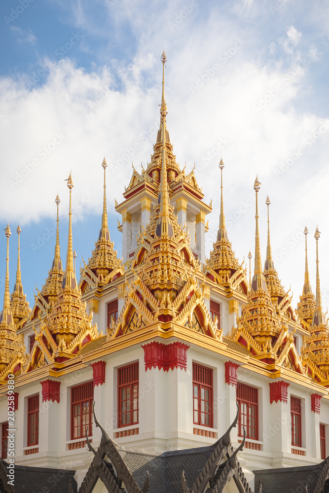 details of Wat Ratchanatdaram roofs in Bangkok , Thailand