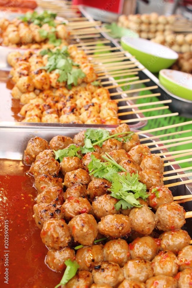 Fried meatballs and sausage at street food Fried meatballs and sausage at street food