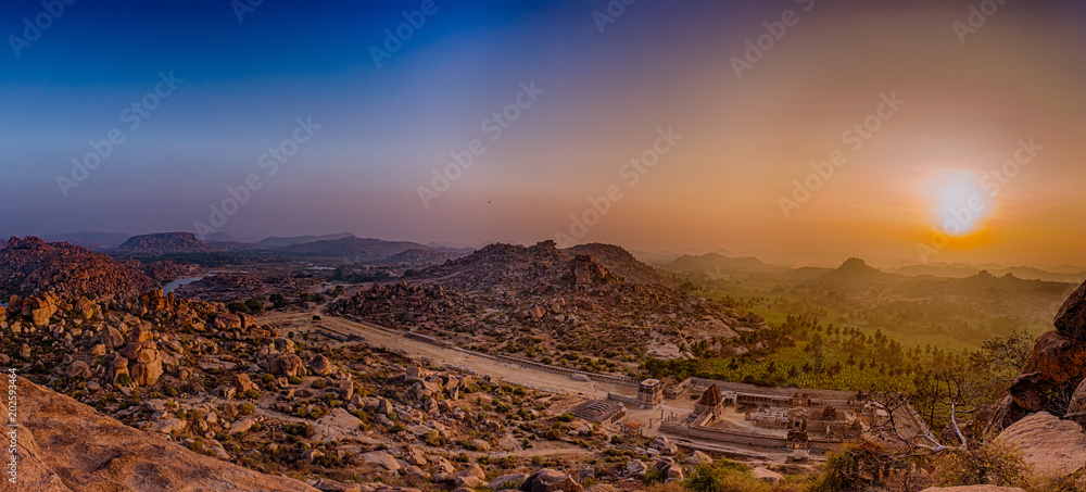 Εκτύπωση καμβά Sunrise over courtesan Street and a view of Tungabhadra river, as viewed from at