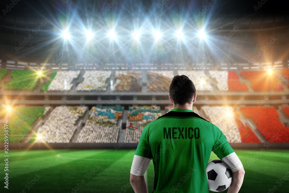 Φωτογραφία Mexico football player holding ball against stadium full of mexico football fans