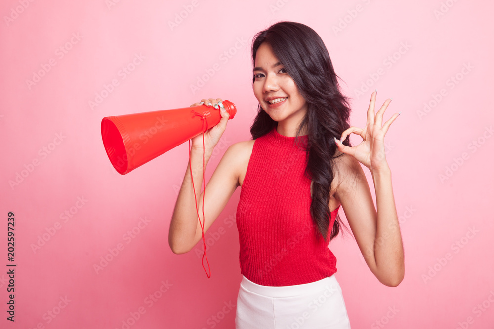 Beautiful young Asian woman show OK announce with megaphone. Beautiful young Asian woman show OK announce with megaphone.