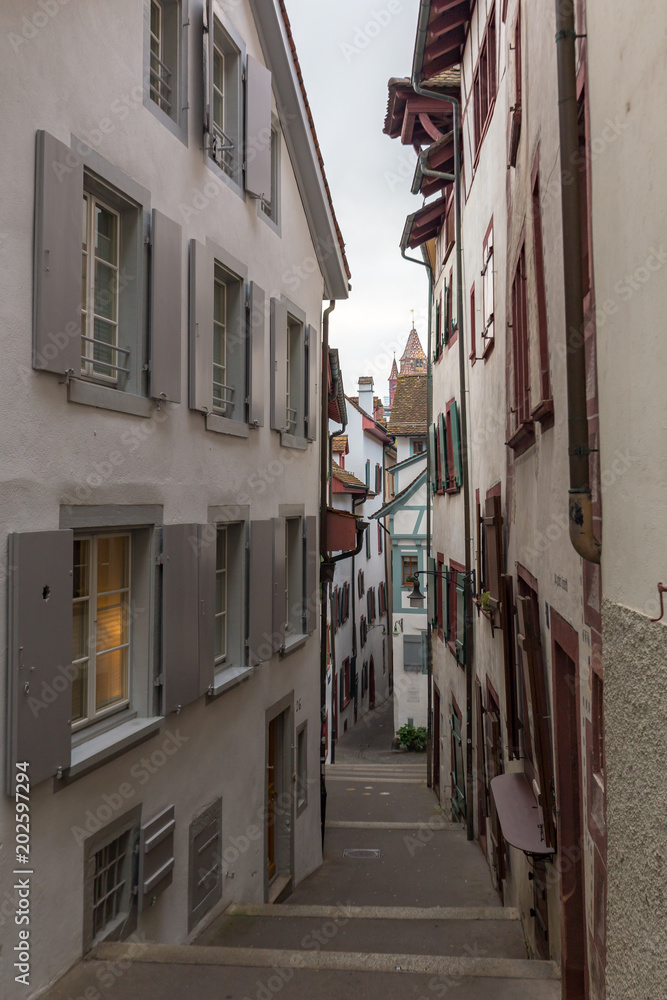 Fototapeta premium Narrow alleyway in the Old Town of Basel, Switzerland