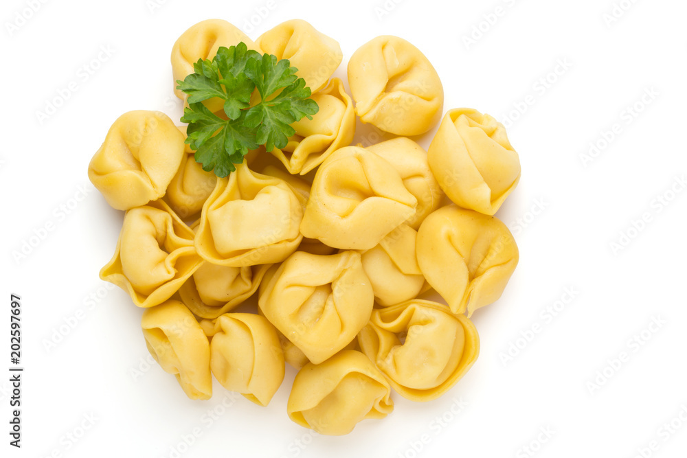 Raw homemade pasta,tortellini with herbs. Raw homemade pasta,tortellini with herbs.