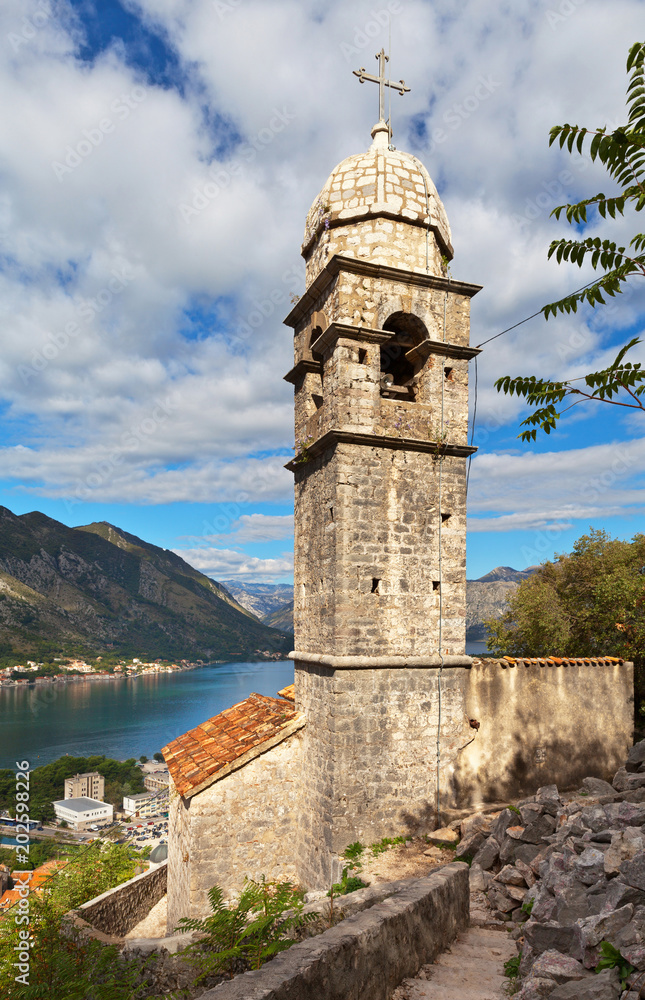 Montenegro. Kotor. The beautiful 15th-century Church of Our Lady of Remedy (Crkva Gospa od Zdravlja) with stone dome on the bell tower (UNESCO-protected) Montenegro. Kotor. The beautiful 15th-century Church of Our Lady of Remedy (Crkva Gospa od Zdravlja) with stone dome on the bell tower (UNESCO-protected)