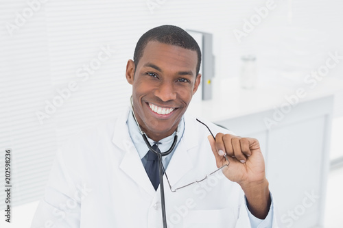 Portrait of a smiling doctor in medical office