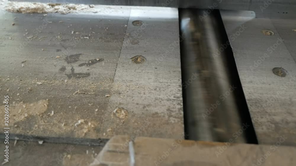 Working the sander machine in workshop. Manufacturing.
Working the sander machine in workshop. Manufacturing.
