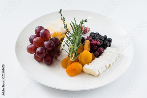 cheese plate with grapes