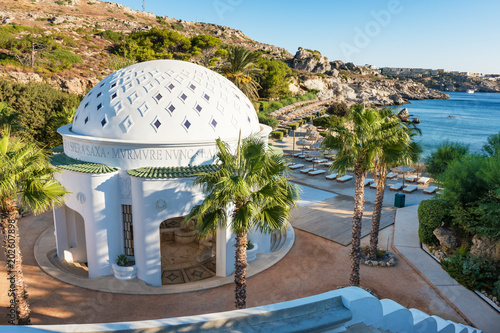 Dome in Kalithea (Rhodes, Greece) - Text translation: "… through the rocks - Rumble now "