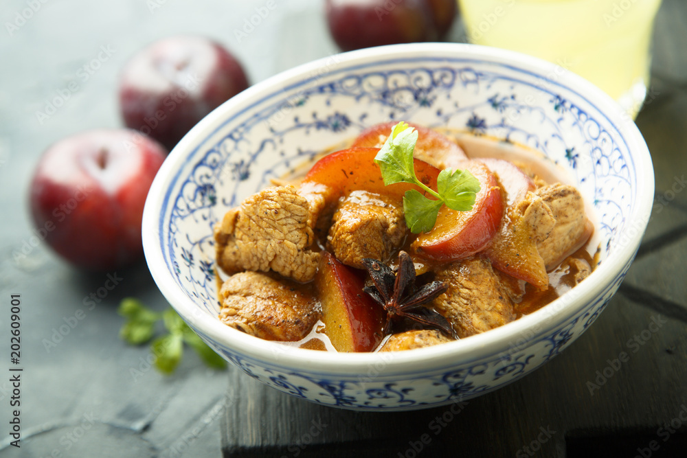 Meat stew with plums and spices