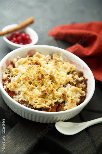 Homemade crumble dessert with red berriies