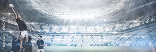 Stadium against sky against rugby players jumping for line out