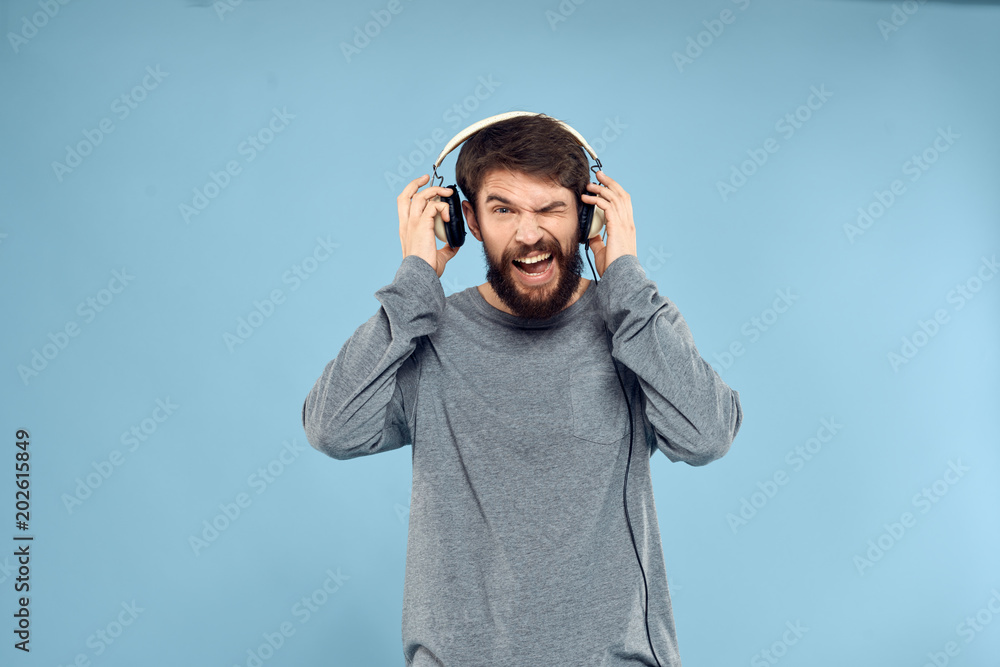 Fototapeta premium young man with headphones listening to music