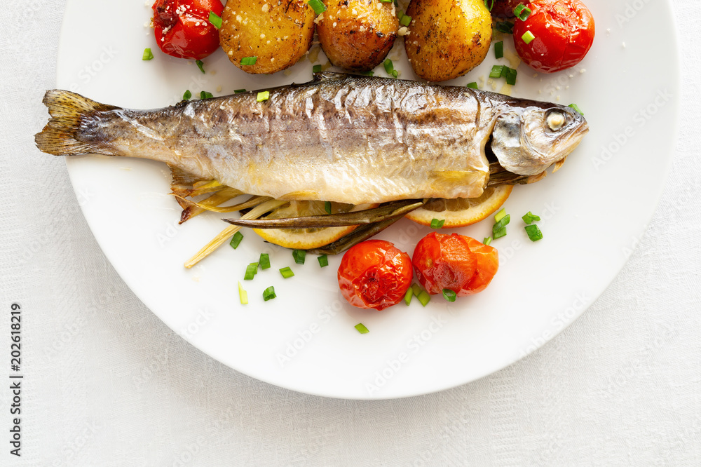 roasted fish with vegetables and onion