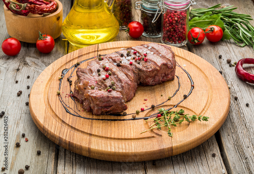 fried steak on bone photo