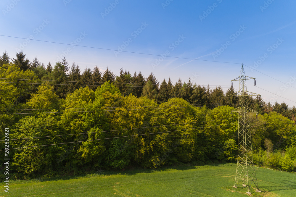 Obraz premium Landschaftsaufnahme Wald, Wiesen und Felder