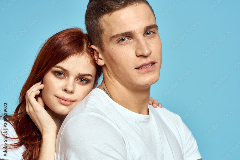 beautiful woman leaned on the back of a young man beautiful woman leaned on the back of a young man