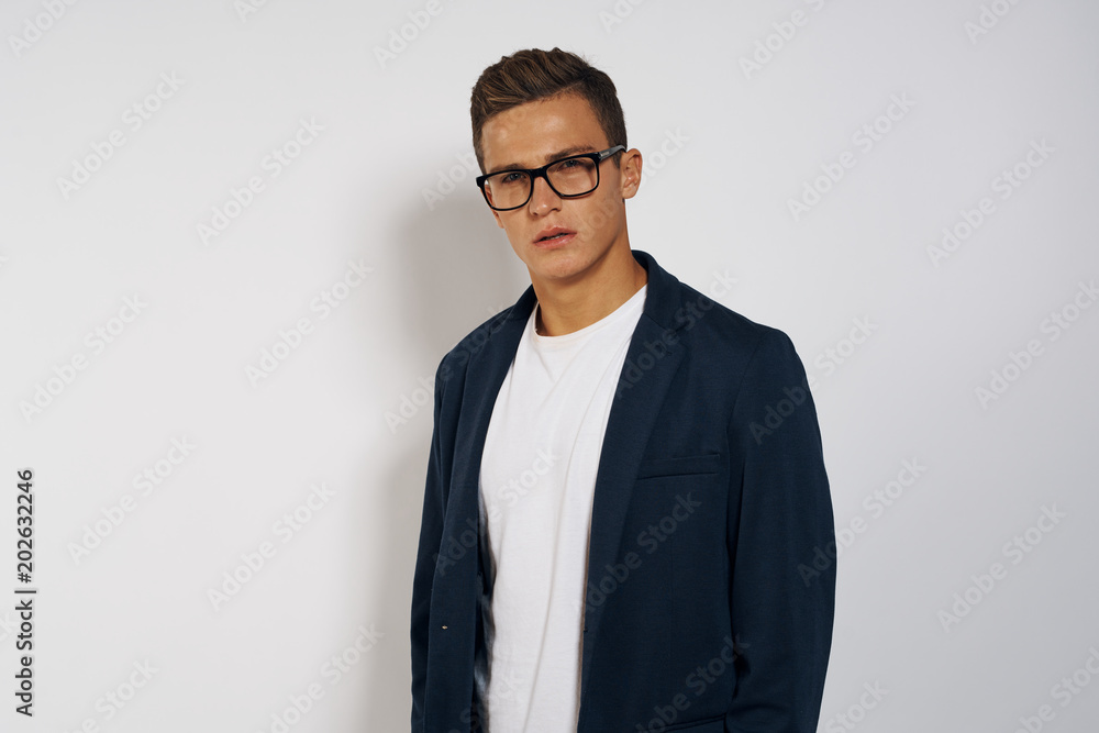 portrait of young man in glasses portrait of young man in glasses