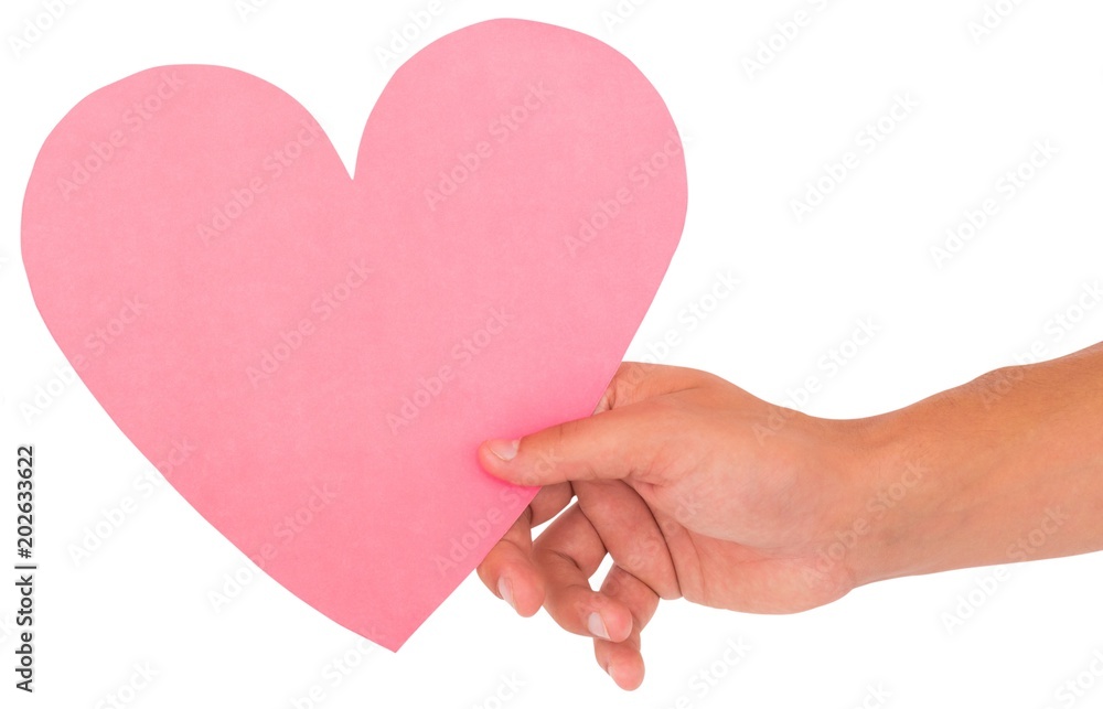 Hand holding heart Hand holding heart