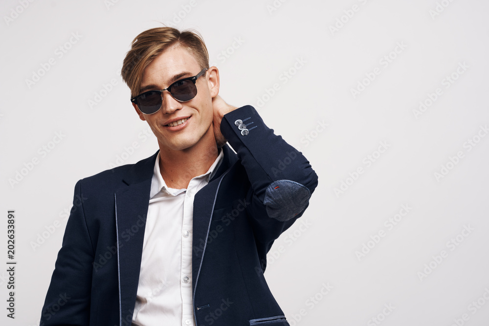 portrait of young man with sunglasses portrait of young man with sunglasses