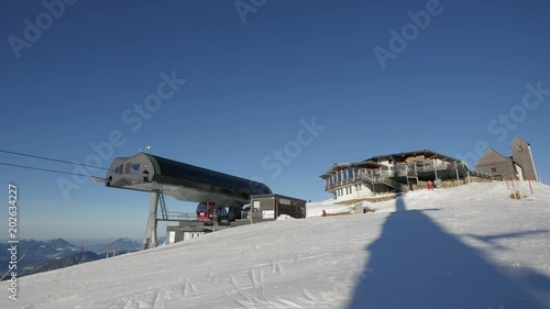 Cable car riding at Kitzb√ºhel ski resort photo