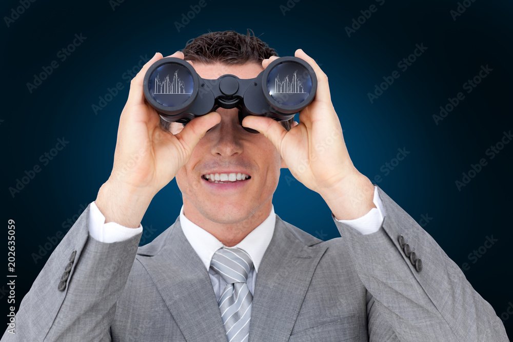 Businessman holding binoculars against blue background with vignette Businessman holding binoculars against blue background with vignette