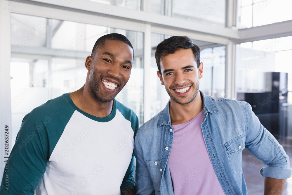 Portrait of male business colleagues standing together Portrait of male business colleagues standing together