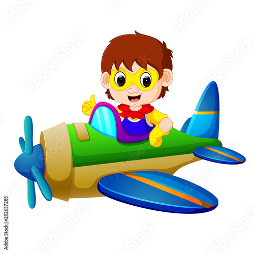 superhero boy riding flying plane