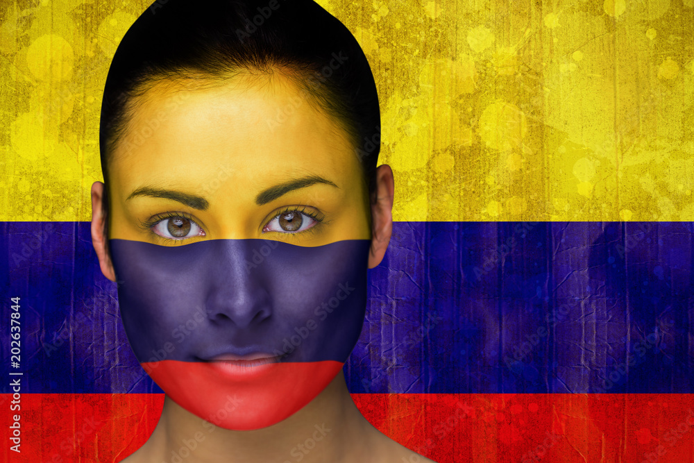 Φωτογραφία Composite image of beautiful football fan in face paint against colombia flag in