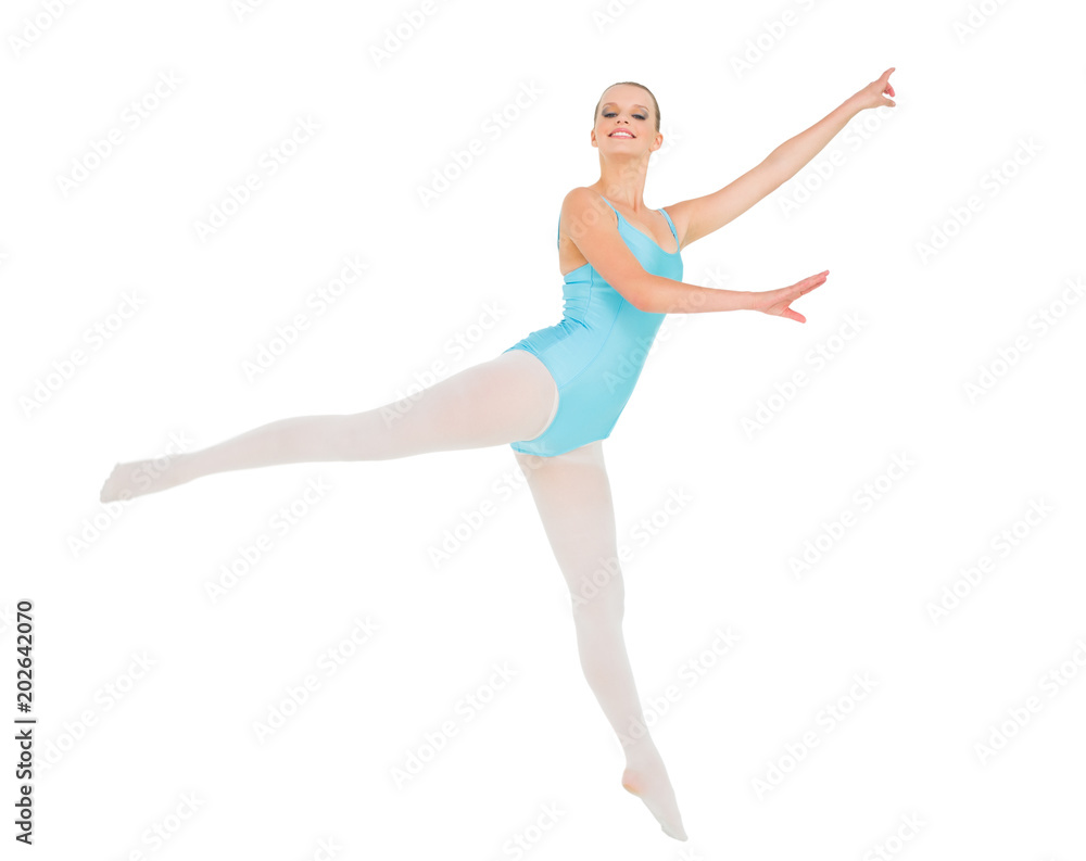 Content pretty ballerina posing and jumping
