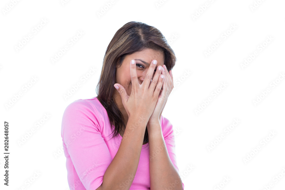 Pretty brunette hiding behind her hands Pretty brunette hiding behind her hands