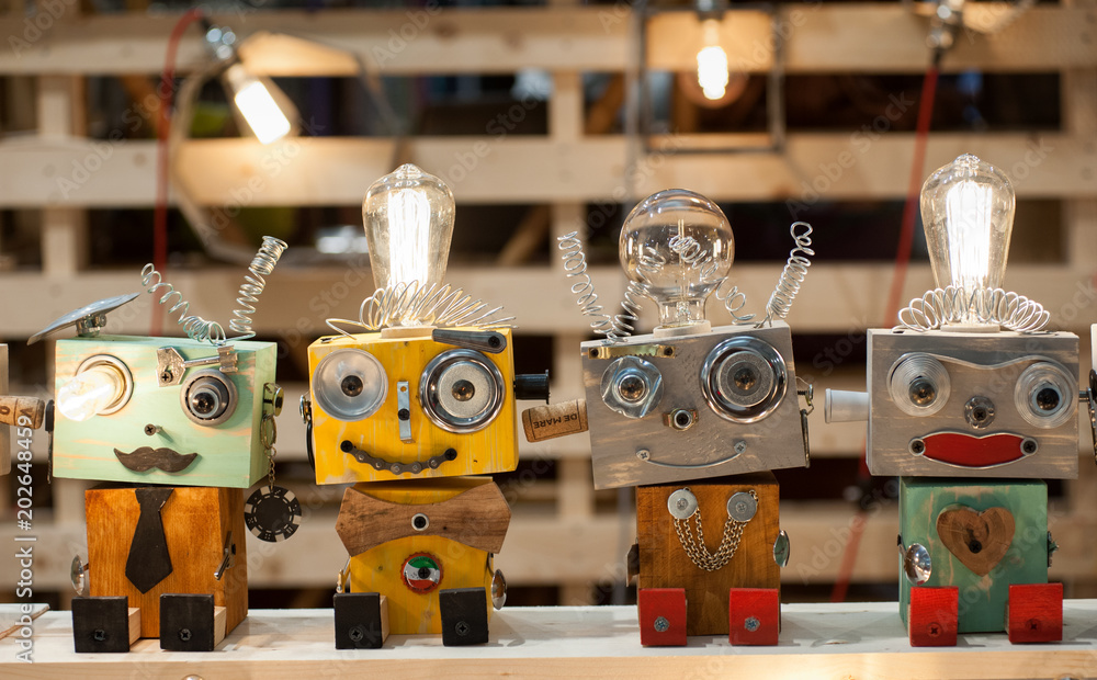 Puppets built with recycled materials on a toy stand - obrazy, fototapety, plakaty 