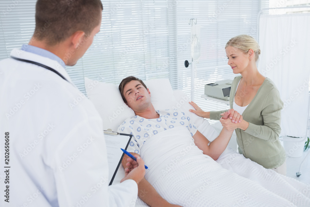 Doctor checking his patient Doctor checking his patient