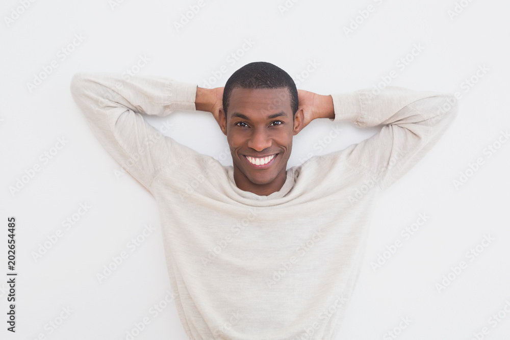 Casual Afro young man against a wall Casual Afro young man against a wall