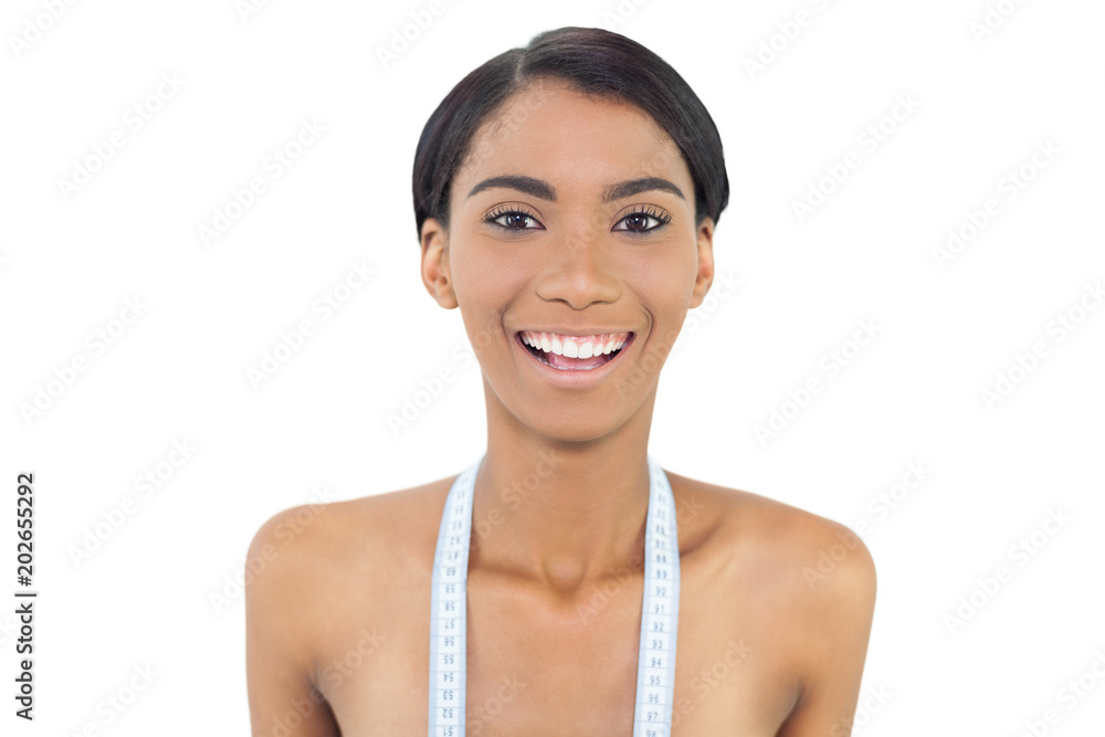 Pretty natural model with measuring tape on shoulders Pretty natural model with measuring tape on shoulders