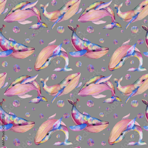 Seamless pattern with watercolor whales, hand painted on a grey background
