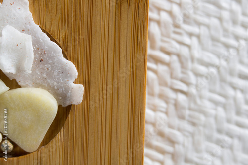 Close-up of cheese with fruit on cutting board photo