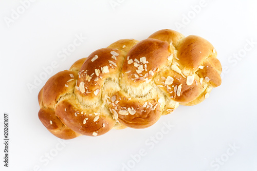 Brioche is a pastry of French origin that is similar to a highly enriched bread, and whose high egg and butter content give it a rich and tender crumb. photo